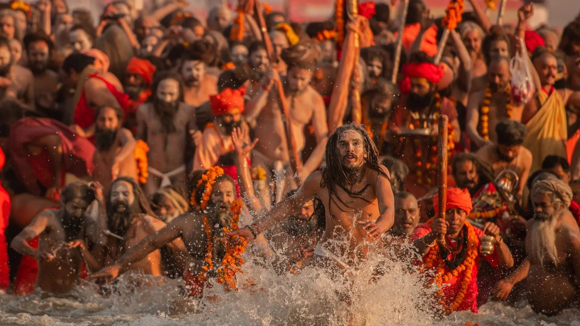 Devotees at Triveni Sangam during the first Amrit Snan of Maha Kumbh 2025 in Prayagraj.