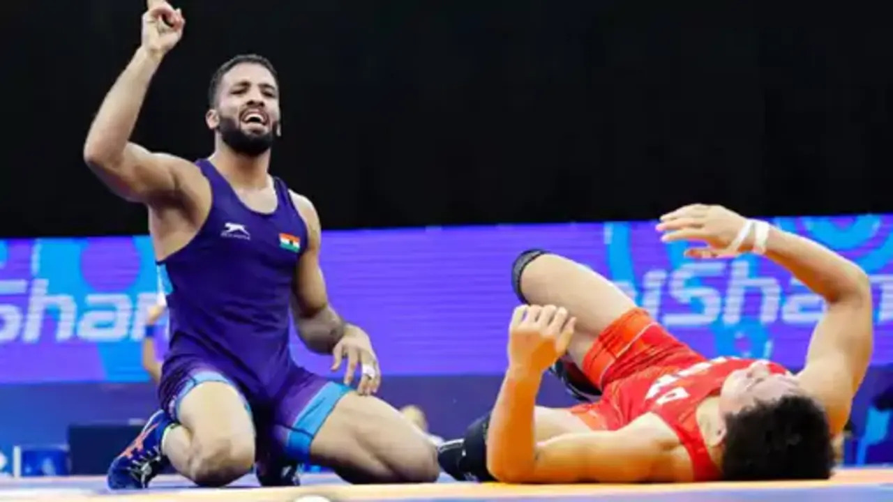 Indian wrestler Sujeet Kalkal celebrating his gold medal win at U23 World Wrestling Championships in Serbia.