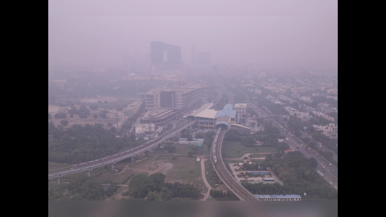 Cloudy skies over India Gate as Delhi-NCR experiences temperature drop and rain alerts.