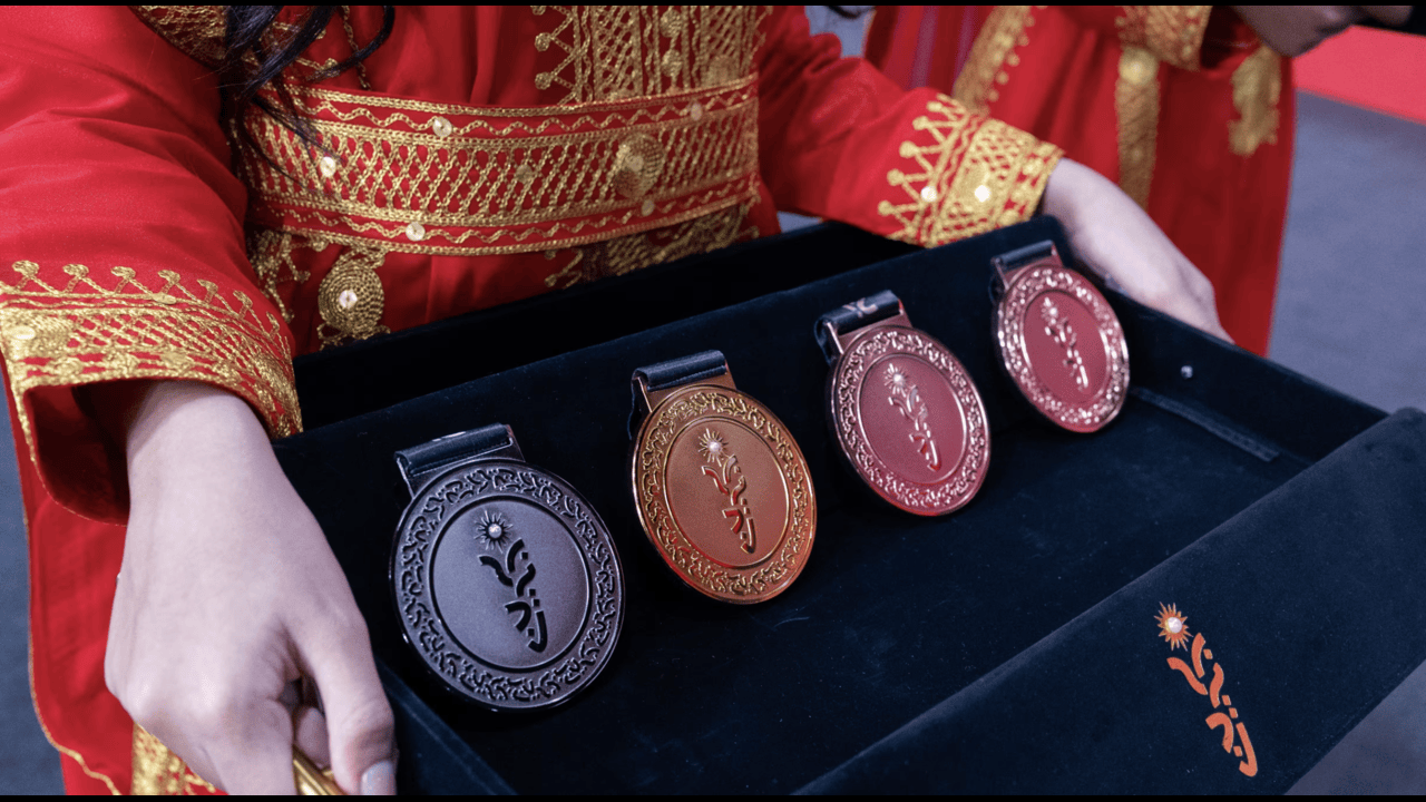 Indian athletes celebrate winning medals at the Asian Youth Games 2025 in Bahrain.