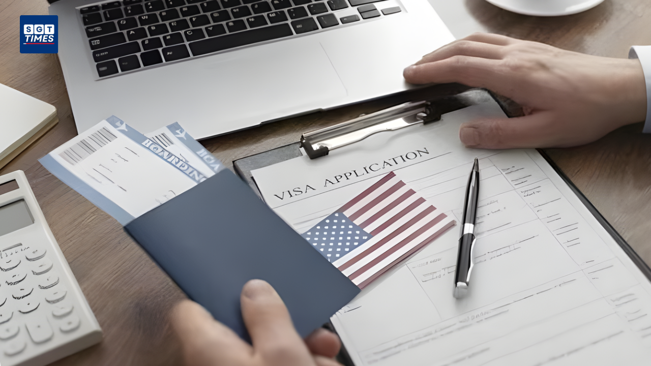 US embassy visa counter with applicants waiting.