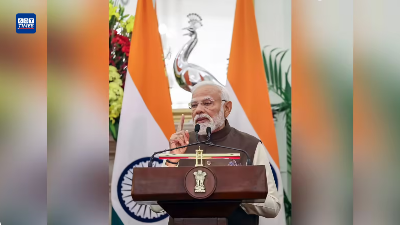 Prime Minister Narendra Modi arriving at the Emergency Landing Facility on Moran Bypass in Assam during inauguration of infrastructure projects including bridges, digital centres and public transport initiatives.