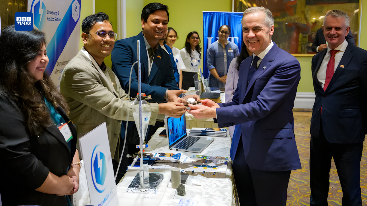 Indian and Canadian academic representatives announcing new university agreements and AI centre collaboration.