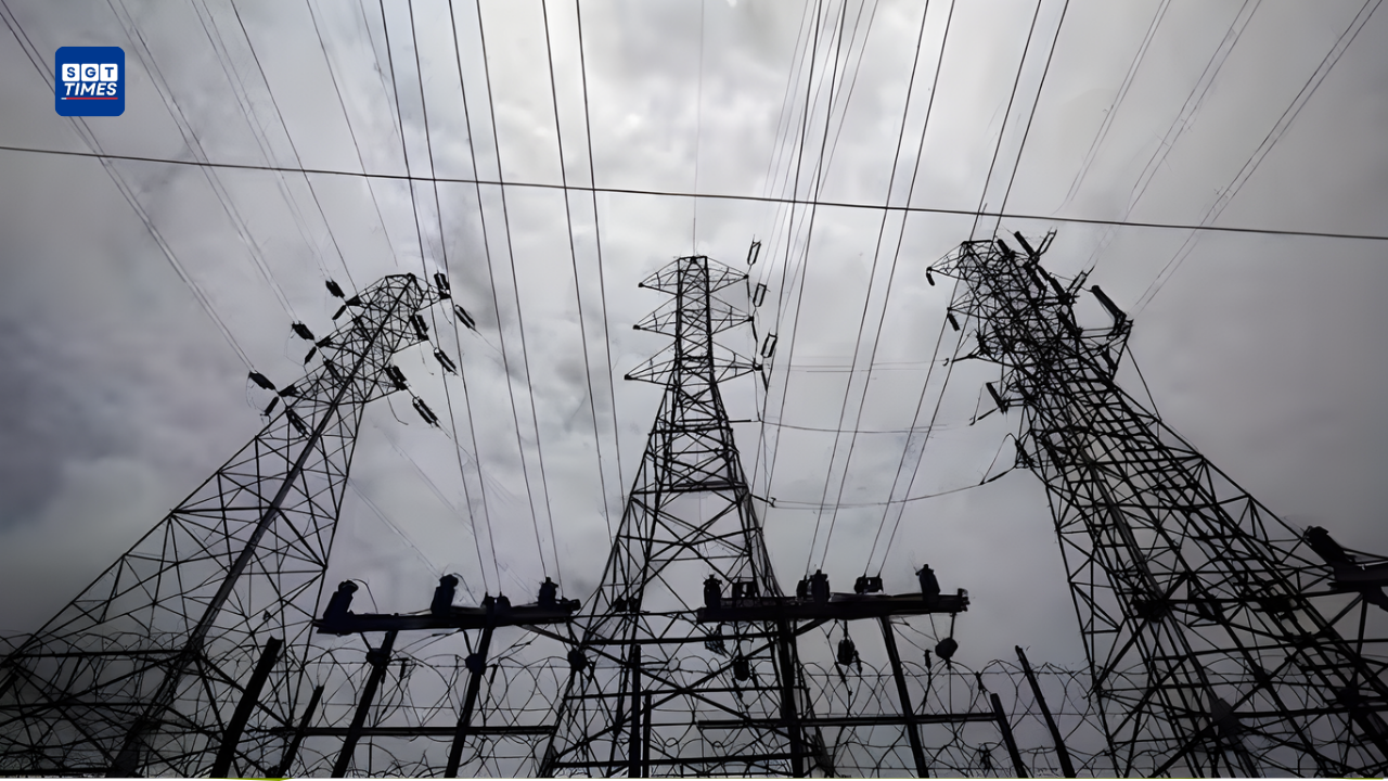 Electricity meter showing rising power consumption with Delhi city background