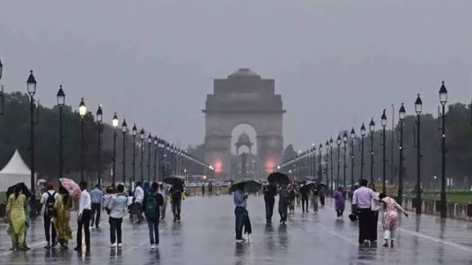 Dark rain clouds gather over an urban landscape as changing weather conditions bring the possibility of thunderstorms, lightning and strong winds across parts of northern India.